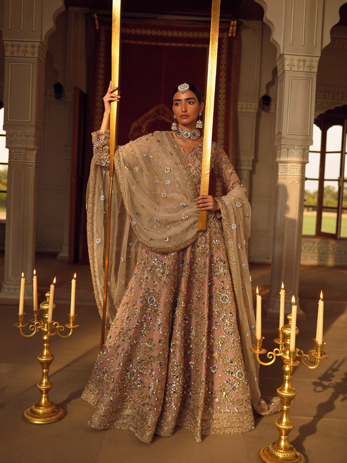 Woman in an embroidered festive anarkali in a heritage haveli