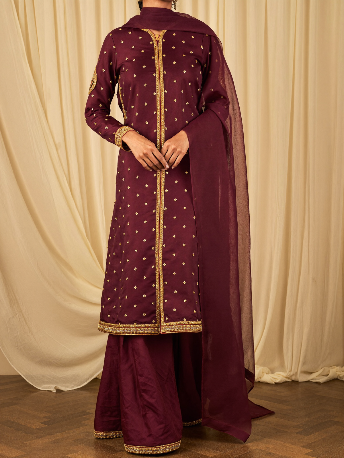 Maroon silk kurta with gota-patti, sharara and organza dupatta